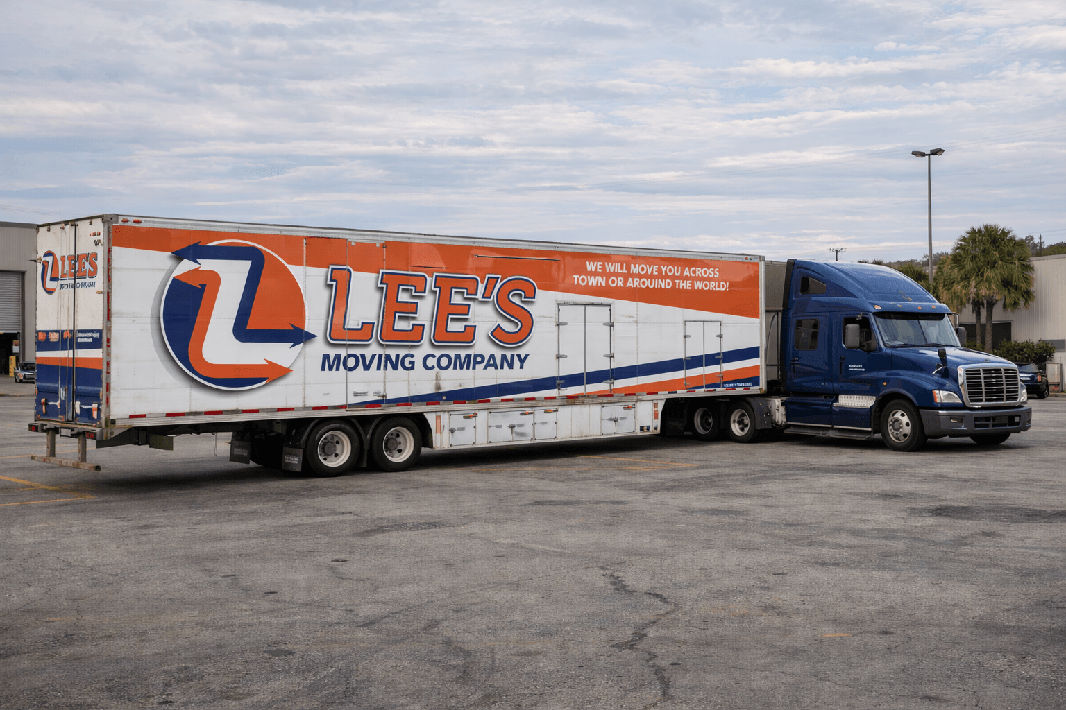 Lee's Moving truck near the Pompano Beach Pier and Fishing Village with the ocean behind it